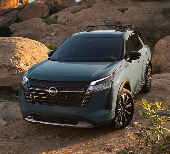 A photo of a 2026 Nissan Pathfinder trim level vehicle parked on rocky terrain.