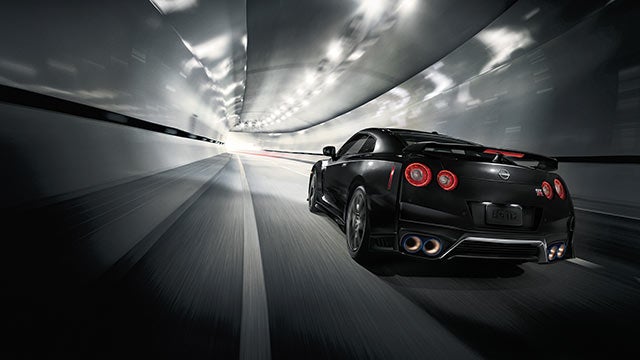 2023 Nissan GT-R seen from behind driving through a tunnel | Nationwide Nissan in Timonium MD